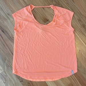 Underarmour women’s large workout shirt. Flowy not tight but breathable.Like new